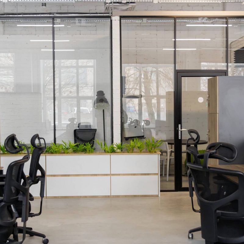 interior-of-modern-coworking-space-without-people-containing-tables-and-chairs-1.jpg